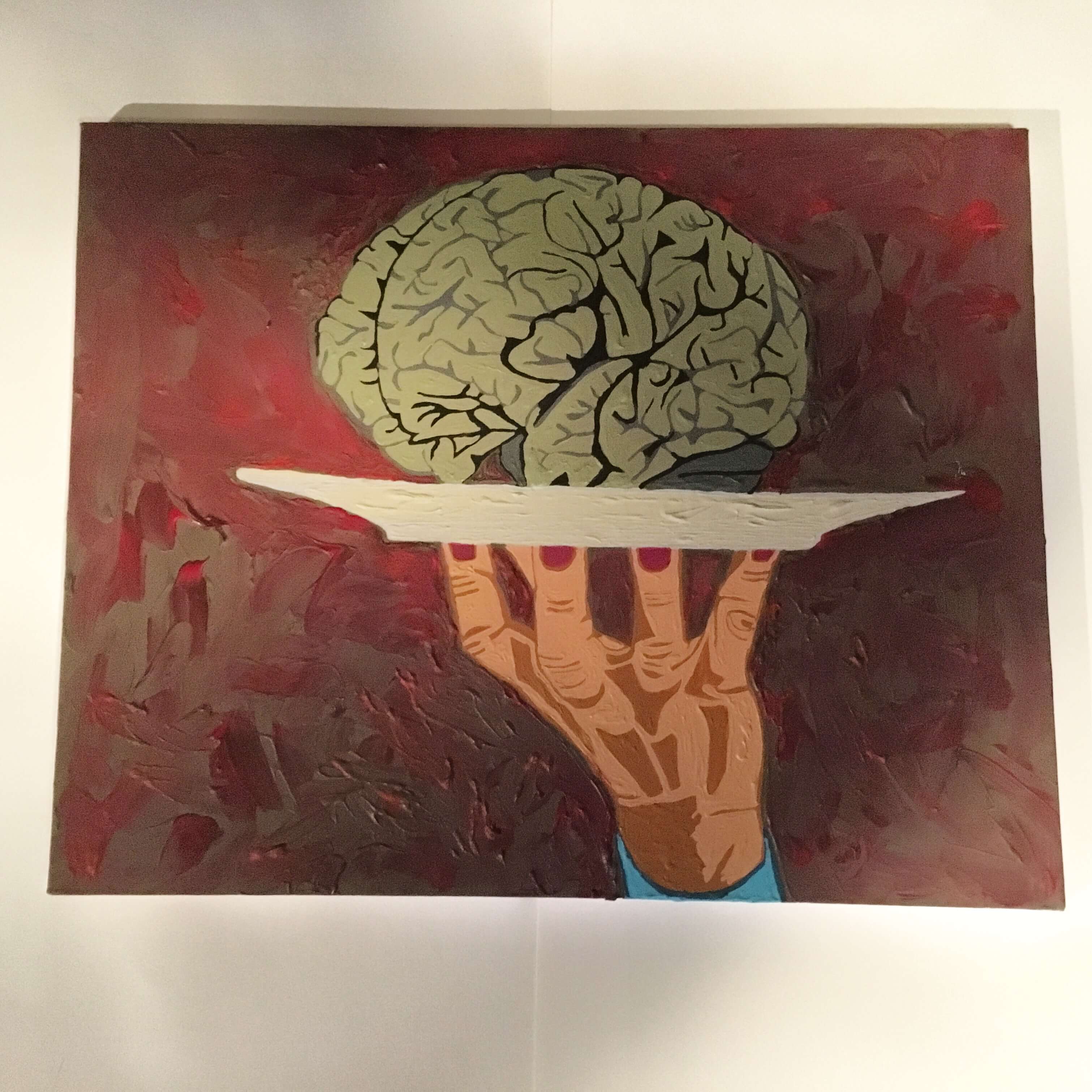 Horror-painting of a brain on a plate